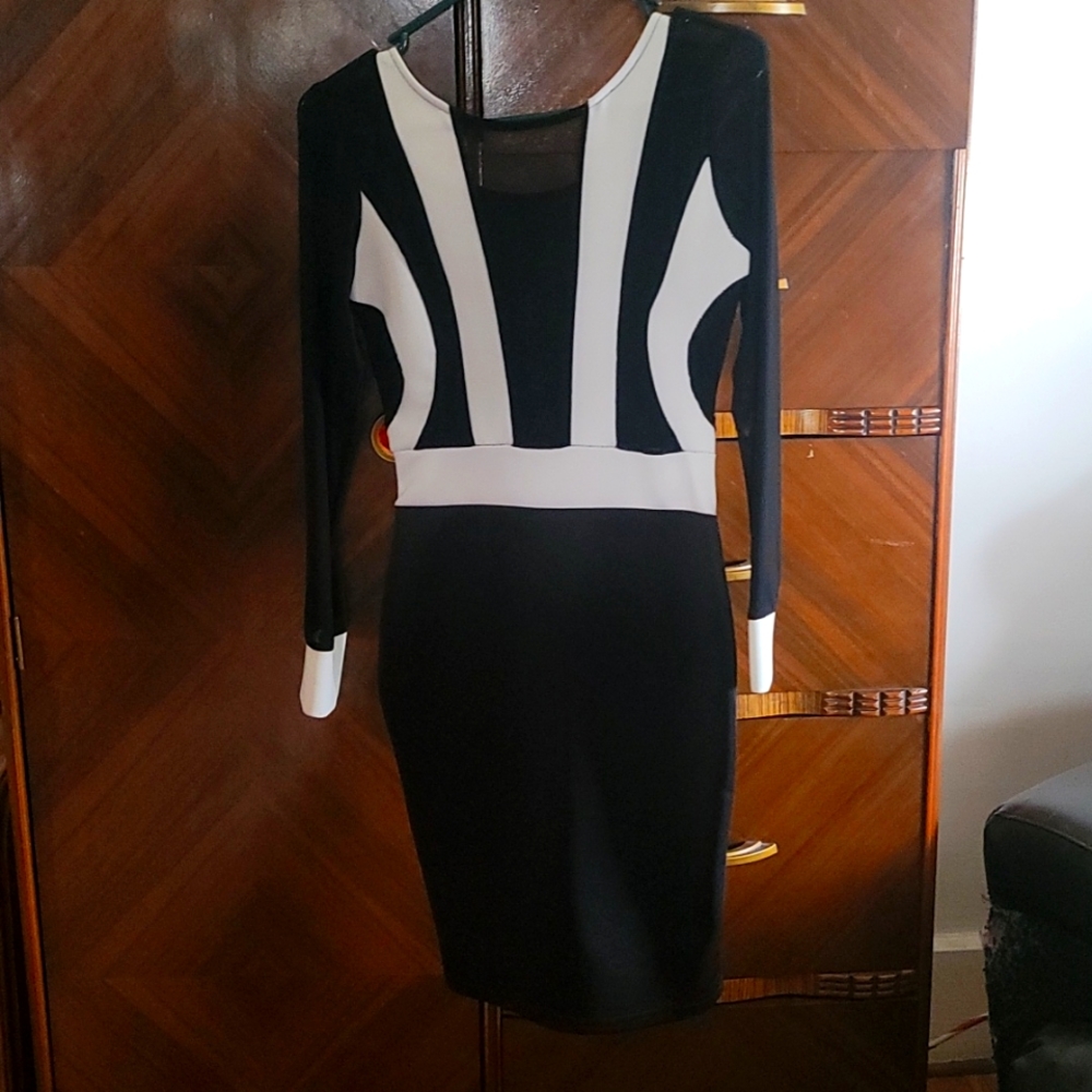 Black and white knee length dress.